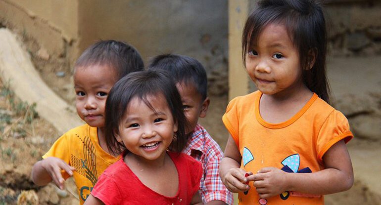 A group of children standing next to each other.